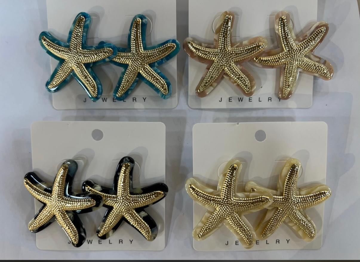 Deniz yıldızı formunda, gold ve gümüş renk 4'lü küpe seti