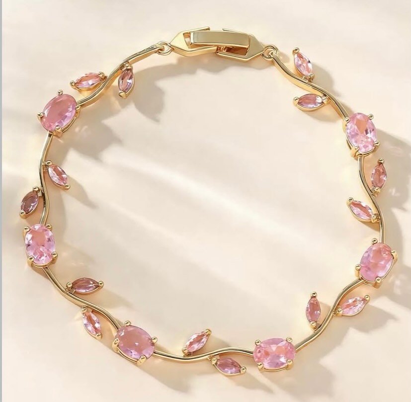 Pembe oval taşlı, altın renkli tenis bileklik